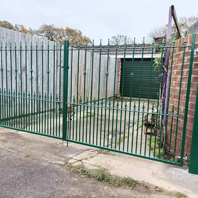 green wrought iron gates