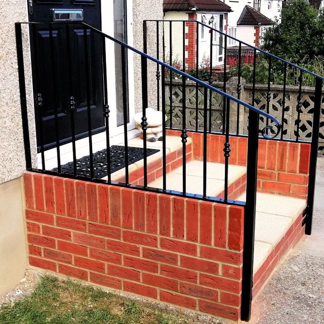 Wrought iron handrail on steps